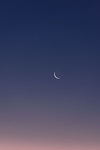 Venus and Mars above the crescent Moon