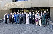 Ministers, their delegations and other guests with ESO staff at the ESO Supernova