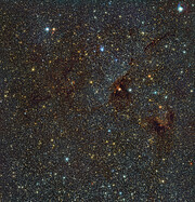 En infraröd vy av nebulosan NGC 6188 och stjärnhopen NGC 6193