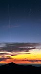 Guide star lasers at sunset