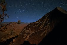 Orion raising over petroglyphs