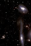The Hooked Galaxy and its Companion