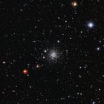 An Ancient Cluster of Stars Against a Stunning Background