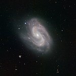 HAWK-I Instrument Spies a Super Galaxy