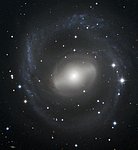 Barred Spiral Galaxy Swirls in the Night Sky