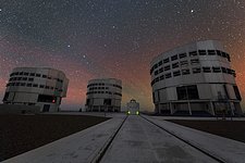 An Auxiliary Telescope Among Three Giants in UHD
