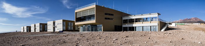 A vast hotel stands in the desert
