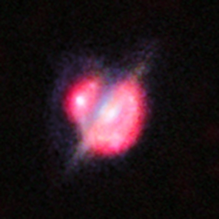 Merging galaxies in the distant Universe through a gravitational magnifying glass