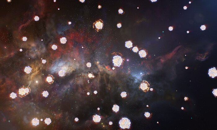 This artist’s impression shows a black, yellowish and reddish gas cloud. There are a lot of small spherical objects of different sizes spread uniformly over the image. They look like enlarged atoms, and they represent the chemical elements that are present in the gas cloud.