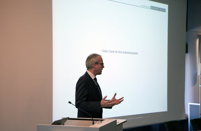 Director of Administration presenting at the Visitor Centre signing event