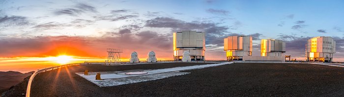 Sunset behind the Paranal telescopes